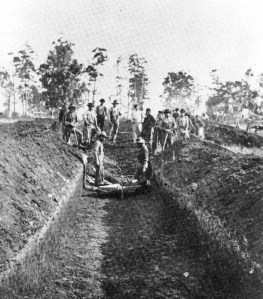 Mass  burial of Union prisoners at Andersonville, GA. Confederate prison camp.