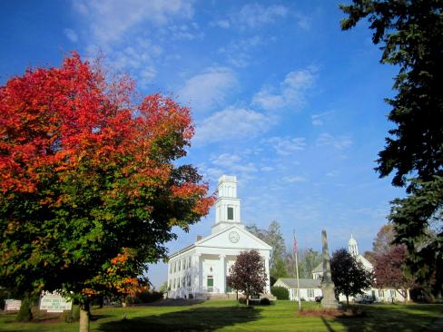A sugar maple frames the historic Congregational Churchon the Plymouth Green.